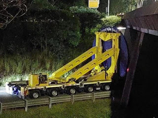 Warrego Highway Accident: Westbound Lanes Closed After Truck Carrying Wind Turbine Hits Bridge